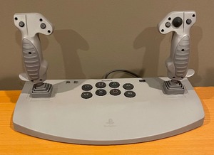 lot 97 image: Sony Playstation Analog Joystick and Remote Control