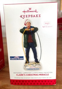 lot 168 image: 4 Hallmark Keepsakes National Lampoons Vacation Themed Ornaments