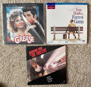 lot 203 image: Grouping of Movie Laser Discs including Grease, Forest Gump and More
