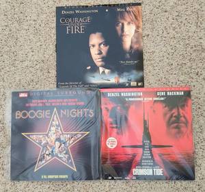 lot 198 image: Selection of 12 Fun Movies on Laser Discs