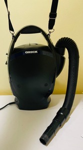 lot 302 image: Oreck Ultimate Handheld Vacuum with 10 Bags, Manual, Attachments, Shoulder Strap