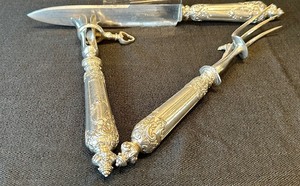 lot 21 image: Set of Three Vintage Silver Serving Utensils