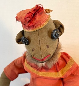 lot 427 image: Vintage Stuffed Monkey, Doll and Small Pottery Faces
