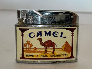 lot 140 image: Vintage Collectible Penguin Camel Lighter
