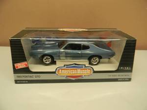ERTL AMERICAN MUSCLE 118 SCALE COLLECTORS EDITION - 1969 PONTIAC GTO - NICE - GREAT PIECE - NEW IN BOX - SEE PICTURES