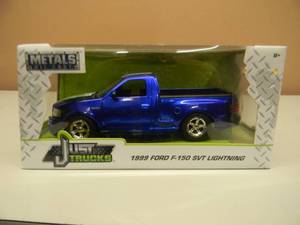 JADA JUST TRUCKS 124 SCALE DIE-CAST - 1999 FORD F-150 SVT LIGHTNING - NICE - GREAT PIECE - NEW IN BOX - SEE PICTURES