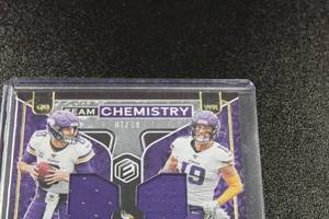 lot 81 image: 2020 Elements Team Chemistry Dual Jersey Kirk CousinAdam Thielen 149 & 2018 Elite Aspirations Adam Thielen 699