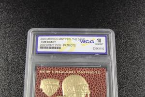 lot 97 image: 2006 Merrick Mint Feel The Game 2000 Draft Pick Tom Brady Gold Card WCG 10