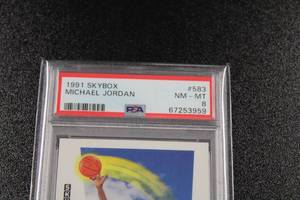lot 99 image: 1991-92 Skybox Michael Jordan #583 PSA 8