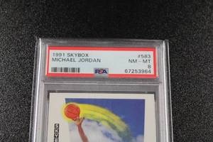 lot 102 image: 1991-92 Skybox Michael Jordan #583 PSA 8