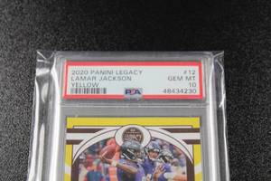 lot 137 image: 2020 Legacy Yellow Lamar Jackson #12 PSA 10 8150  Only 150 Exist  Serial Number Matches Jersey Number