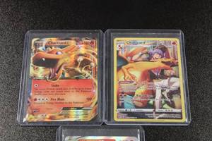 lot 138 image: Pokemon Charizard Trading Card Lot  3 Charizard Cards