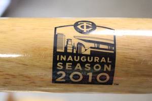 lot 174 image: Minnesota Twins Mixed Years SGA Bat Day Resale Lot  15 Commemorative Bats