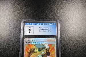 lot 109 image: 2017 Pokemon Sun & Moon Professor Kukui #148149 CGC 9