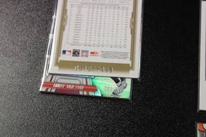 lot 191 image: Mixed Sports Jersey Relic & Serial Numbered Lot  4 Cards