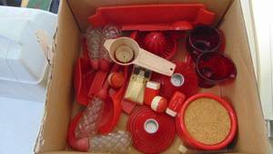 lot 21 image: Red plastic, some glass kitchen items