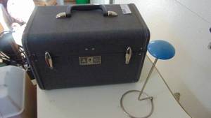 lot 23 image: Vintage travel case and shelf hat holder