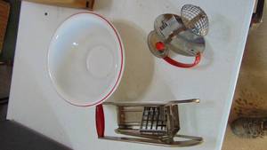 lot 28 image: White bowl with red trim and 2 red handle kitchen items