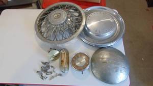 lot 89 image: Lot of misc hub caps and car parts