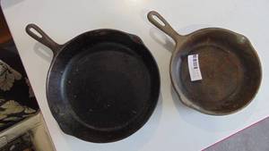 lot 135 image: 2- cast iron pans