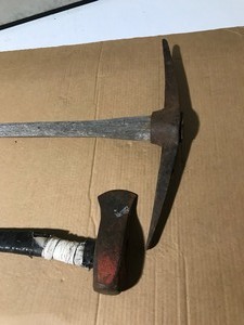 lot 27 image: Vintage splitting mall and pick ax