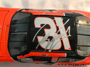 lot 54 image: 2003 NASCAR Action Racing Robby Gordon #31 Cingular 124 scale die cast stock car with autograph