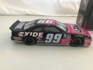 lot 369 image: 1997 NASCAR MAC Tools Jeff Burton #99 Exide Batteries 124 scale die cast stock car