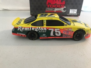 lot 379 image: 1998 NASCAR MAC Tools Rick Mast #75 Remington 124 scale die cast stock car bank