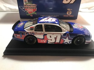 lot 386 image: 1997 NASCAR Revell Collection #97 Texas Special Inaugural 118 die cast stock car