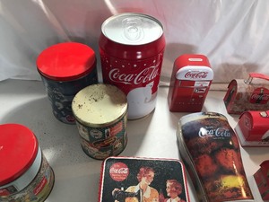 lot 127 image: 18 Coca cola tins