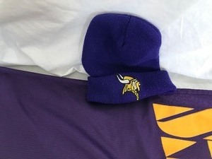 lot 151 image: Minnesota Vikings Football Flag and Stocking Cap
