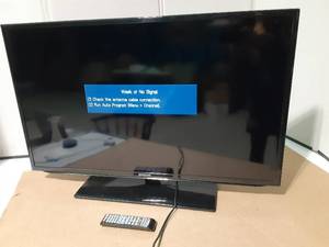 lot 265 image: 40 samsung TV w remote