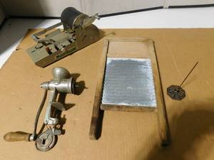 lot 210 image: A holder,print o maticntique washboard, meat grinder,receipt