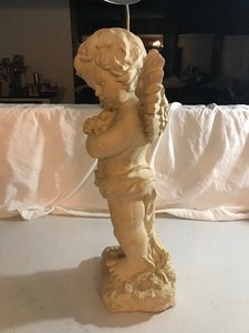 lot 182 image: Angel statue holding a rabbit