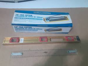 lot 233 image: 14 Tile Cutter, Ruler & 2 Level