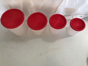 lot 186 image: 4 piece Vintage sugar and flour Tupperware canister set