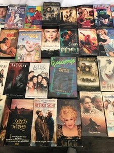 lot 190 image: Lot of VHS tapes and 5 DVDs