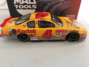 lot 282 image: 2002 NASCAR MAC Tools Mike Skinner #4 Kodak Max Films  Yosemite Sam 124 scale die cast stock car