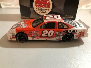 lot 416 image: 2001 NASCAR MAC Tools Collectors Club Tony Stewart #20 Home Depot  Coca Cola Polar Bear 124 scale die cast stock car