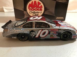 lot 423 image: 2001 NASCAR MAC Tools Johnny Benson #10 Valvoline  James Dean 124 scale die cast stock car