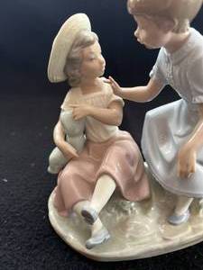 lot 57 image: Lladro Nao Two Girls with Baby Figurine