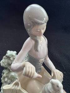 lot 60 image: Lladro Young Girl Feeding Lamb Figurine