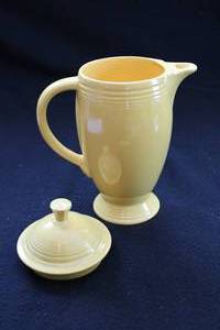 lot 139 image: Vintage Yellow Fiestaware Coffee Pot