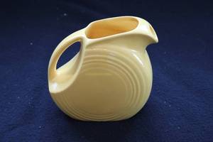 lot 140 image: Vintage Yellow Fiestaware Pitcher