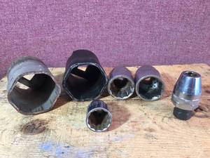 lot 106 image: Group Larger Axel Nut Type Sockets