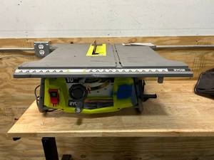 lot 23 image: RYOBI RTS12T 10 Table Saw