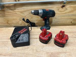 lot 122 image: BOSCH 14.4 Volt Cordless Drill with 2 Batteries and a Charger