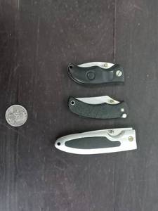 lot 179 image: Three Magnum Folding Knives