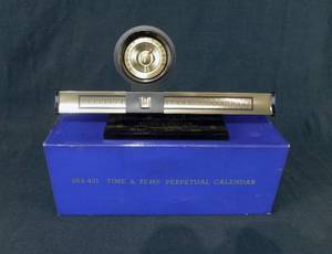 lot 4 image: Vintage Time and Temp Perpetual Calendar