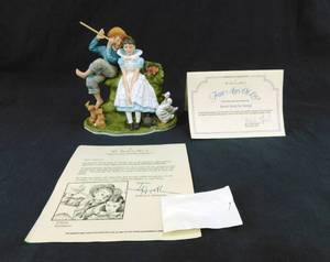 lot 8 image: The Danbury Mint Norman RockwellFour Ages of Love - Sweet Song so Young Porcelain Figure Collection